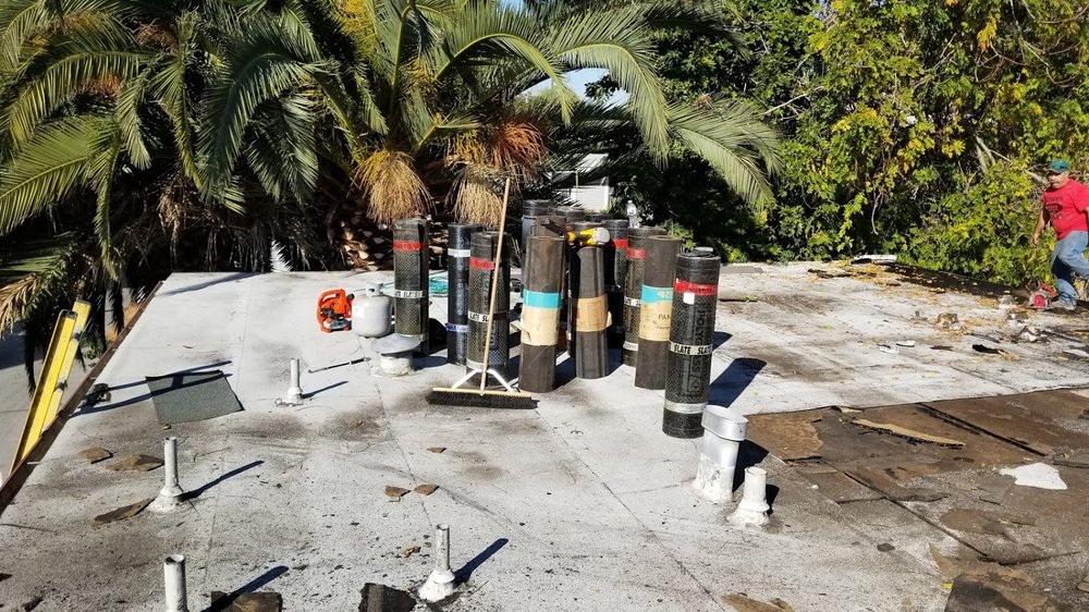 Slide of Trio Roofing Contractors