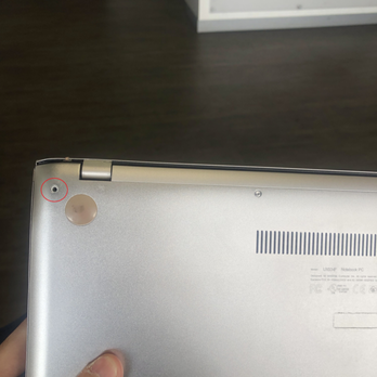 uBreakiFix - Photographs showing the missing screw position after pickup - Electronics Repair Near Me - Phoenix, Arizona