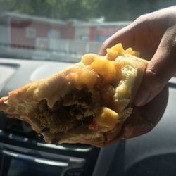 Mason’s Super Dogs - The Mad Mango Dog (vegan btw) -Establishment in the background.
