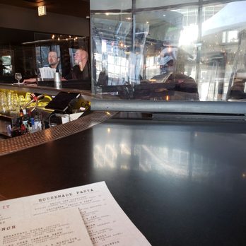 Siena Tavern - Dividers between the patrons sitting at the bar - Italian Near Me - Chicago, Illinois Siena Tavern - Dividers between the patrons sitting at the bar - Italian Near Me - Chicago, Illinois