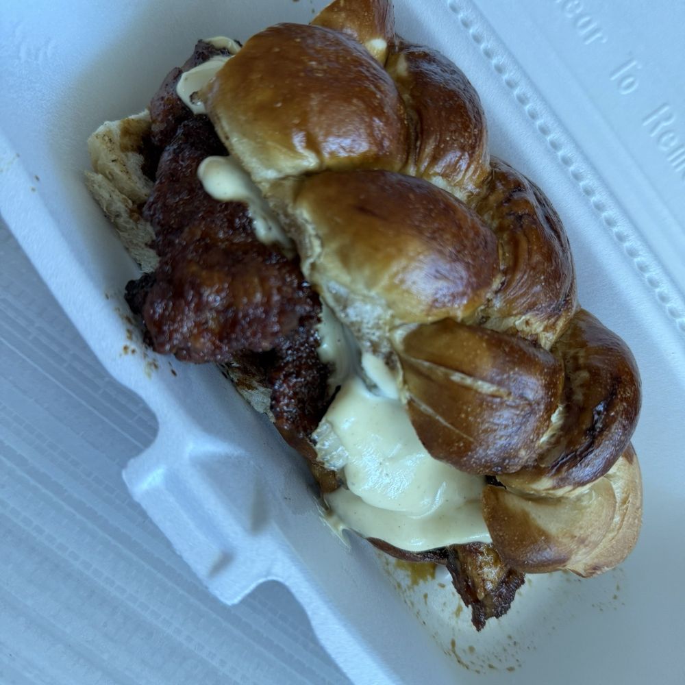 Braided bites - Honey licked chicken in a skated pretzel bun - Food Trucks Near Me