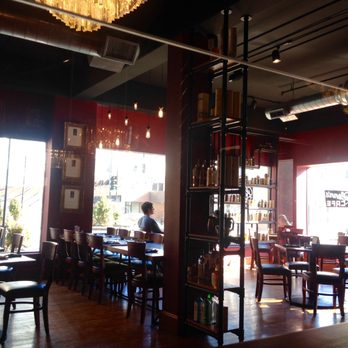 Glenn's Cafe - Love the industrial touches, warm wood and lighting. It feels open and intimate all at once. - Wine Bars Near Me - Columbia, Missouri