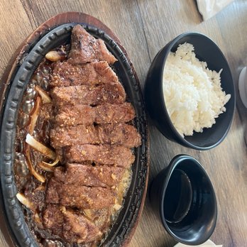 Saito & Pho - Wafu steak, delicious sauce & sautéed onions, served with rice. - Vietnamese Near Me - Kaneohe, Hawaii