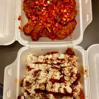 Wow! Wing House - two takeout containers of food - Chicken Wings Near Me - Toronto, Ontario Wow! Wing House - two takeout containers of food - Chicken Wings Near Me - Toronto, Ontario