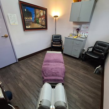 Dewald Chiropractic - Chiropractic therapy room. We usually have you on EMS/Heat for a bit, then some hands on work prior to the adjustment. - Chiropractors Near Me - Palmdale, California