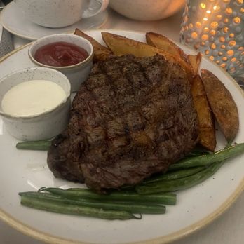 1864 The Restaurant - The 12oz ribeye was perfectly medium rare & melted in our mouths....so were their fries! - Seafood Near Me - Saint John, Virgin Islands