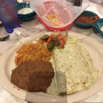 Chuy's - Chicken enchiladas with a cilantro lime sauce - Tex-Mex Near Me - Orlando, Florida Chuy's - Chicken enchiladas with a cilantro lime sauce - Tex-Mex Near Me - Orlando, Florida