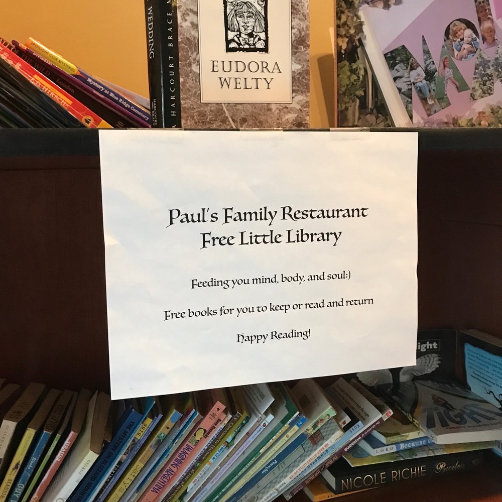 Paul's Family Restaurant - a sign on a book shelf - American Near Me - Elgin, Illinois