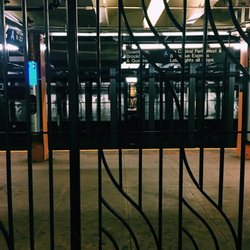 MTA - Dyckman St Station - 1 Line - The platform. Brightly lit. And a there's always a subway attendant.