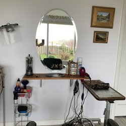 Brandi McCarthy - View in the background though the mirror