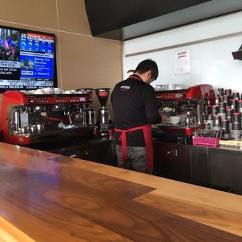 Aroma Espresso Bar - Awesome barista warming up my cup before he makes my drink---love it!!! - Coffee & Tea Near Me - Markham, Ontario Aroma Espresso Bar - Awesome barista warming up my cup before he makes my drink---love it!!! - Coffee & Tea Near Me - Markham, Ontario