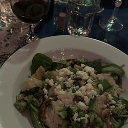 Hug's Italian Cuisine - Mediterranean sautée over fresh spinach instead of pasta