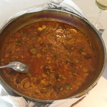 EL Pebre Negre - Arroz meloso de rape almejas y alcachofas - Mediterranean Near Me - Xativa, V EL Pebre Negre - Arroz meloso de rape almejas y alcachofas - Mediterranean Near Me - Xativa, V
