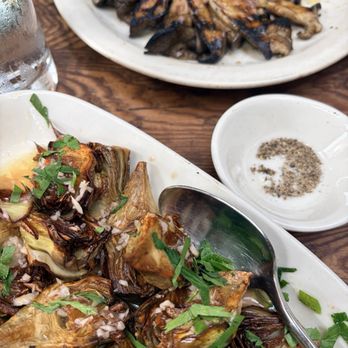Gjelina - The best grilled baby artichokes with mushroom in the back - New American Near Me - Venice, California Gjelina - The best grilled baby artichokes with mushroom in the back - New American Near Me - Venice, California