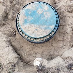 Al's Septic Pumping Service - New plastic lid and riser. Very sturdy and screws into riser for secure closure.