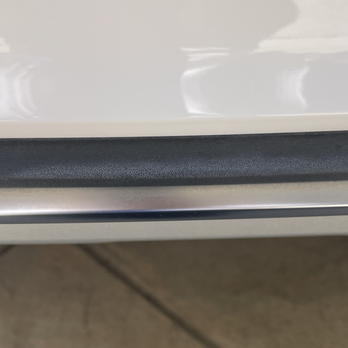 Caliber Collision - White paint on black trim of exterior where they should have covered- this is all through out the inside and outside of my Audi - Body Shops Near Me - Seaside, California