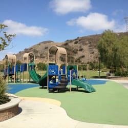 Serrano Park - Soft surface flooring. 2 play sets. One for little kids and one for bigger kids.