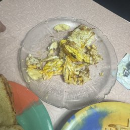 Scrambled eggs was just a fried egg that he messed up and then cut up a bunch. Had black grease bits mixed in lol