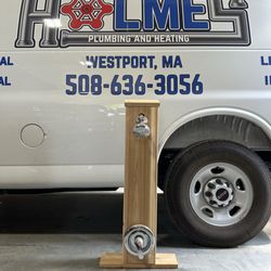 Holmes Plumbing & Heating - Self contained cedar outdoor shower being auctioned