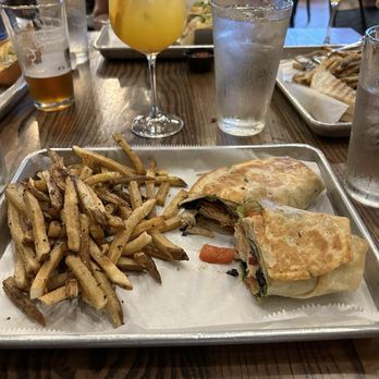 Melt Kitchen and Bar - Salmon wrap and duck fat fries - New American Near Me - Greensboro, North Carolina Melt Kitchen and Bar - Salmon wrap and duck fat fries - New American Near Me - Greensboro, North Carolina