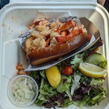 The Restaurant at Rowayton Seafood - Hot buttered lobster roll with side salad and coleslaw, in takeaway container. - Seafood Near Me - Norwalk, Connecticut The Restaurant at Rowayton Seafood - Hot buttered lobster roll with side salad and coleslaw, in takeaway container. - Seafood Near Me - Norwalk, Connecticut
