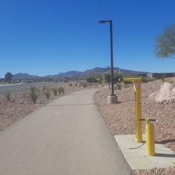 A bicycle station that includes an air pump. This is on the westbound side between Warm Springs and Sunset Roads.