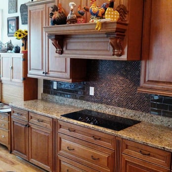 Blanton Floor Covering - a kitchen with wooden cabinets - Carpeting Near Me - Crawford, Georgia Blanton Floor Covering - a kitchen with wooden cabinets - Carpeting Near Me - Crawford, Georgia