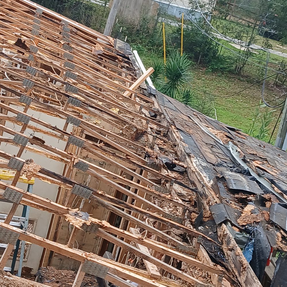 Slide of Three Brothers Roofing