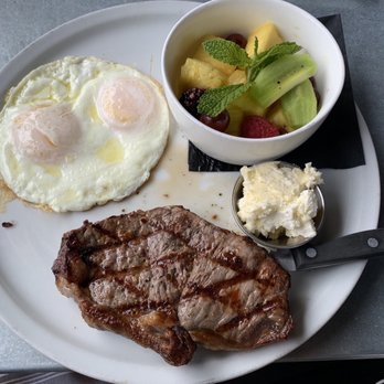 Toast - Steak & eggs (over ez) and awesome fresh fruit with mint leaves. So tasty! Mint leaves cleansed the palate epically! - Breakfast & Brunch Near Me - Temecula, California Toast - Steak & eggs (over ez) and awesome fresh fruit with mint leaves. So tasty! Mint leaves cleansed the palate epically! - Breakfast & Brunch Near Me - Temecula, California