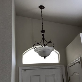 Hudsons Construction - a light fixture hanging from the ceiling - General Contractors Near Me