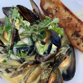 Schooners Monterey - Muscles in a coconut milk sauce - Seafood Near Me - Monterey, California Schooners Monterey - Muscles in a coconut milk sauce - Seafood Near Me - Monterey, California