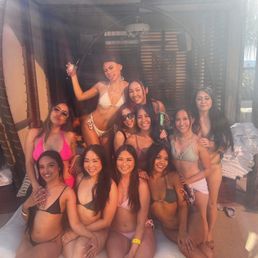 a group of women posing for a picture a group of women posing for a picture
