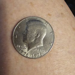 National Rare Coins abd Estate Buyers - Kennedy half dollare with no mint mark