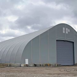 Alaska Structures - 120' wide x 400' long fabric building for coal ash removal project.
