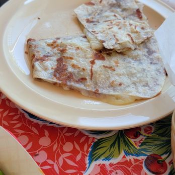 Vamos Tacos - Super cheesy quesadilla, you can also get it with meat and crema and toppings. - Tacos Near Me - Huntington Park, California Vamos Tacos - Super cheesy quesadilla, you can also get it with meat and crema and toppings. - Tacos Near Me - Huntington Park, California