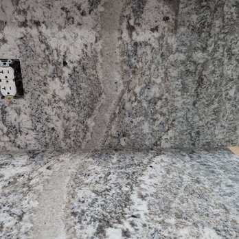 Marble Palace - Monte Cristo granite. Veins on countertop run up backsplash. - Countertop Installation Near Me - Stockton, California