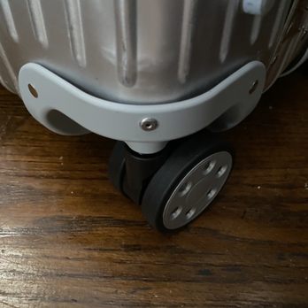 Square Luggage - After: Wheel assembly reattached - Luggage Near Me - Morristown, New Jersey