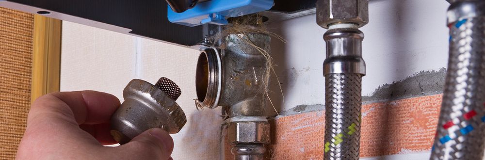 Slide of J&B Drain Cleaning and Plumbing Service