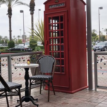 Utopia Caffe - Cute phone booth and locks on the gate - Breakfast & Brunch Near Me - Tustin, California Utopia Caffe - Cute phone booth and locks on the gate - Breakfast & Brunch Near Me - Tustin, California