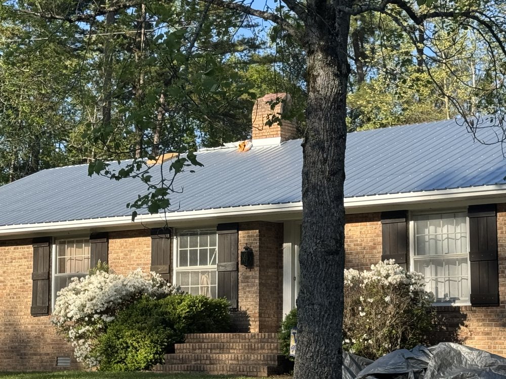 Slide of Robbie Melton Roofing