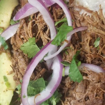 Naco Mexican Eatery - Brisket taco filling - Food Trucks Near Me - San Antonio, Texas