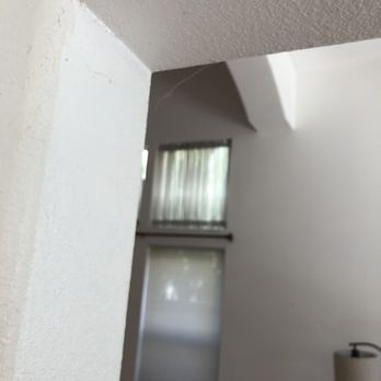 OC Cleaning - Cobwebs in doorway - Window Washing Near Me