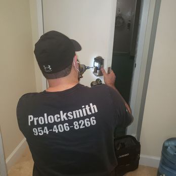 Pro Locksmith - Avi working on drilling the hole for the lock. - Keys & Locksmiths Near Me - Fort Lauderdale, Florida Pro Locksmith - Avi working on drilling the hole for the lock. - Keys & Locksmiths Near Me - Fort Lauderdale, Florida