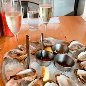 Parkside - a platter of oysters and a glass of wine - Seafood Near Me - Austin, Texas Parkside - a platter of oysters and a glass of wine - Seafood Near Me - Austin, Texas