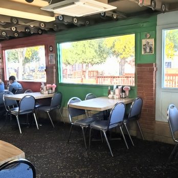 Peggy Sue's 50's Diner - Patio seating looking out at the Dino Garden - Pizza Near Me - Yermo, California Peggy Sue's 50's Diner - Patio seating looking out at the Dino Garden - Pizza Near Me - Yermo, California