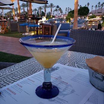 Adobe Grill - a margarita in a glass on a table - Mexican Near Me - La Quinta, California Adobe Grill - a margarita in a glass on a table - Mexican Near Me - La Quinta, California