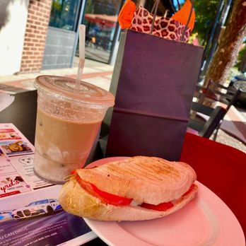 Le Petit Croissant - Iced coffee with lavender and caprese panini - Bakeries Near Me - Greenville, South Carolina