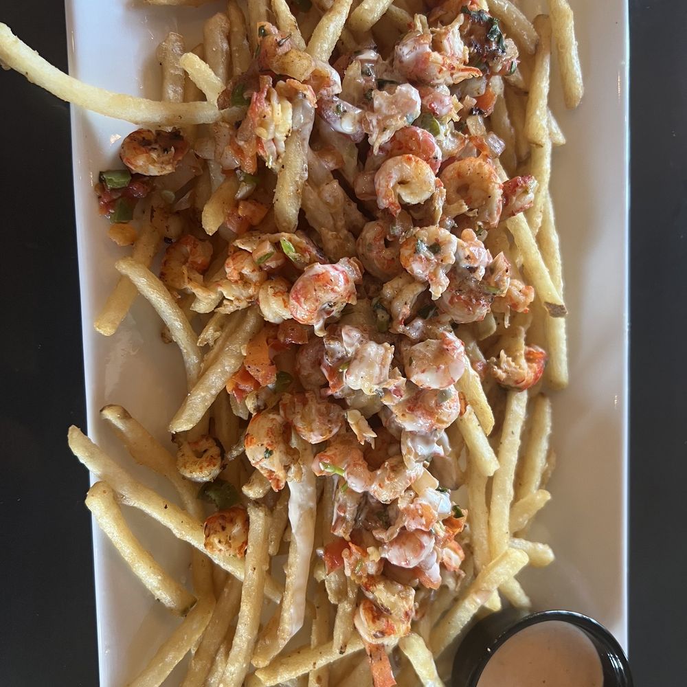 The District - Crawfish Queso Fries - New American Near Me - Ponchatoula, Louisiana The District - Crawfish Queso Fries - New American Near Me - Ponchatoula, Louisiana