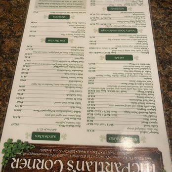 McPartlan's Corner - The menu includes sections for appetizers, salads, main courses, and desserts, with prices listed for each item, and features holiday decorations. - New American Near Me - Buffalo, New York