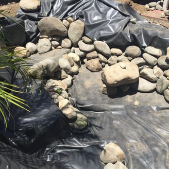 Pacific Ponds & Design - Liner in and laying in the rocks 2 - Landscaping Near Me Pacific Ponds & Design - Liner in and laying in the rocks 2 - Landscaping Near Me